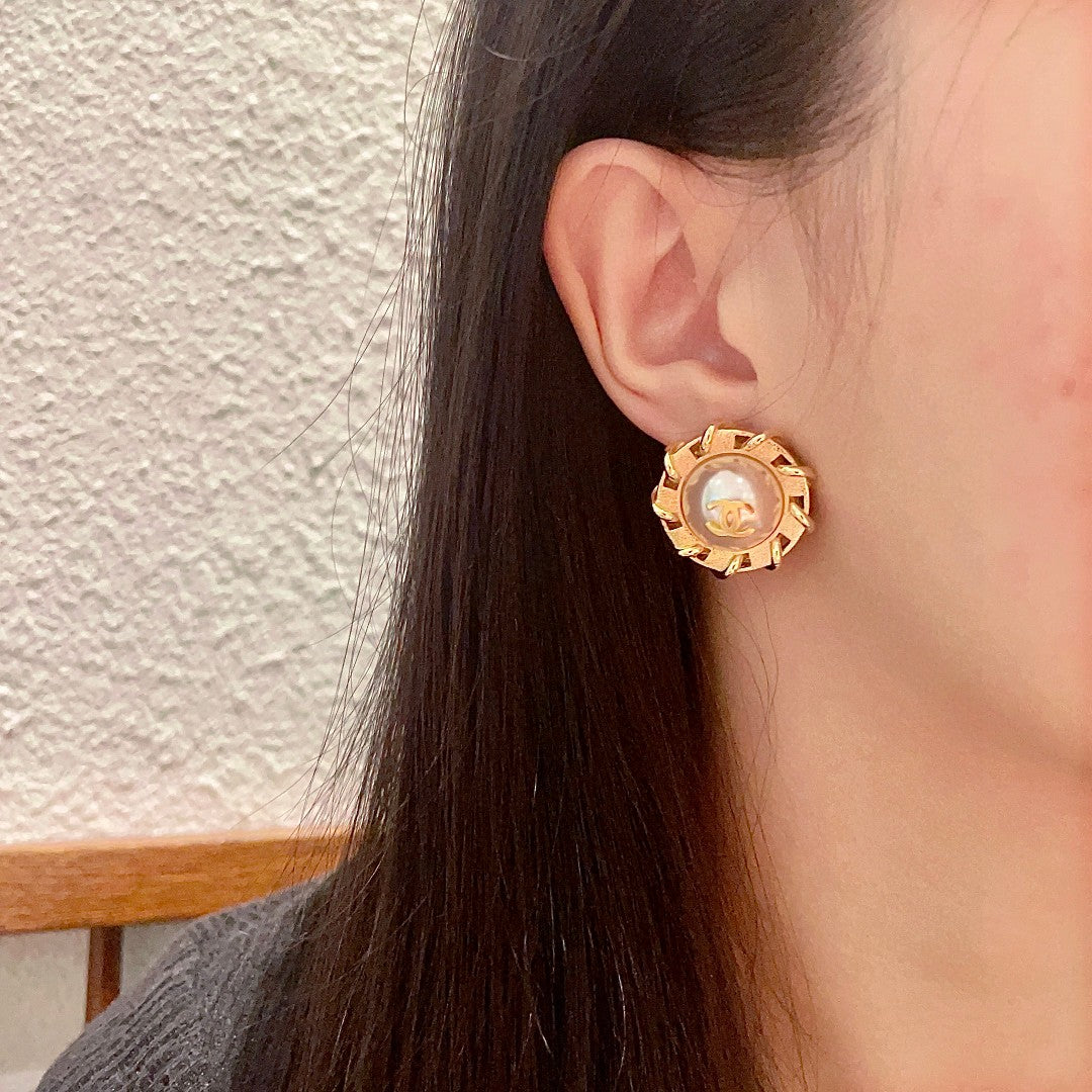 Double-C Emblem Stud Earrings in Polished Metal-Tone – Design 226 detail view