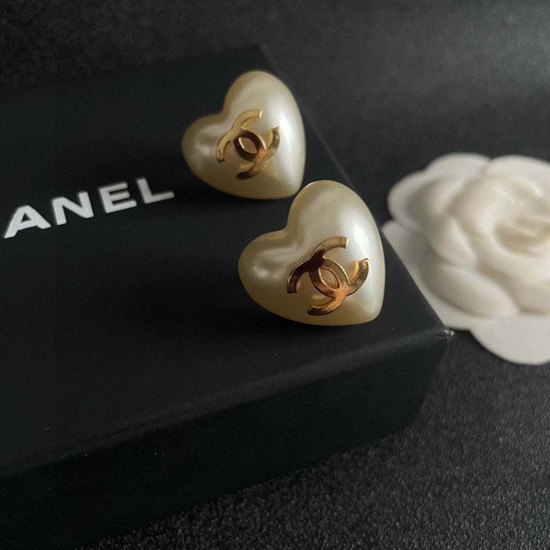 Double-C Emblem Stud Earrings in Polished Metal-Tone – Heart Detail – Design 006 detail view