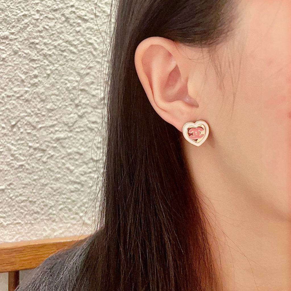 Double-C Emblem Stud Earrings in Polished Metal-Tone – Heart Detail – Design 005 detail view