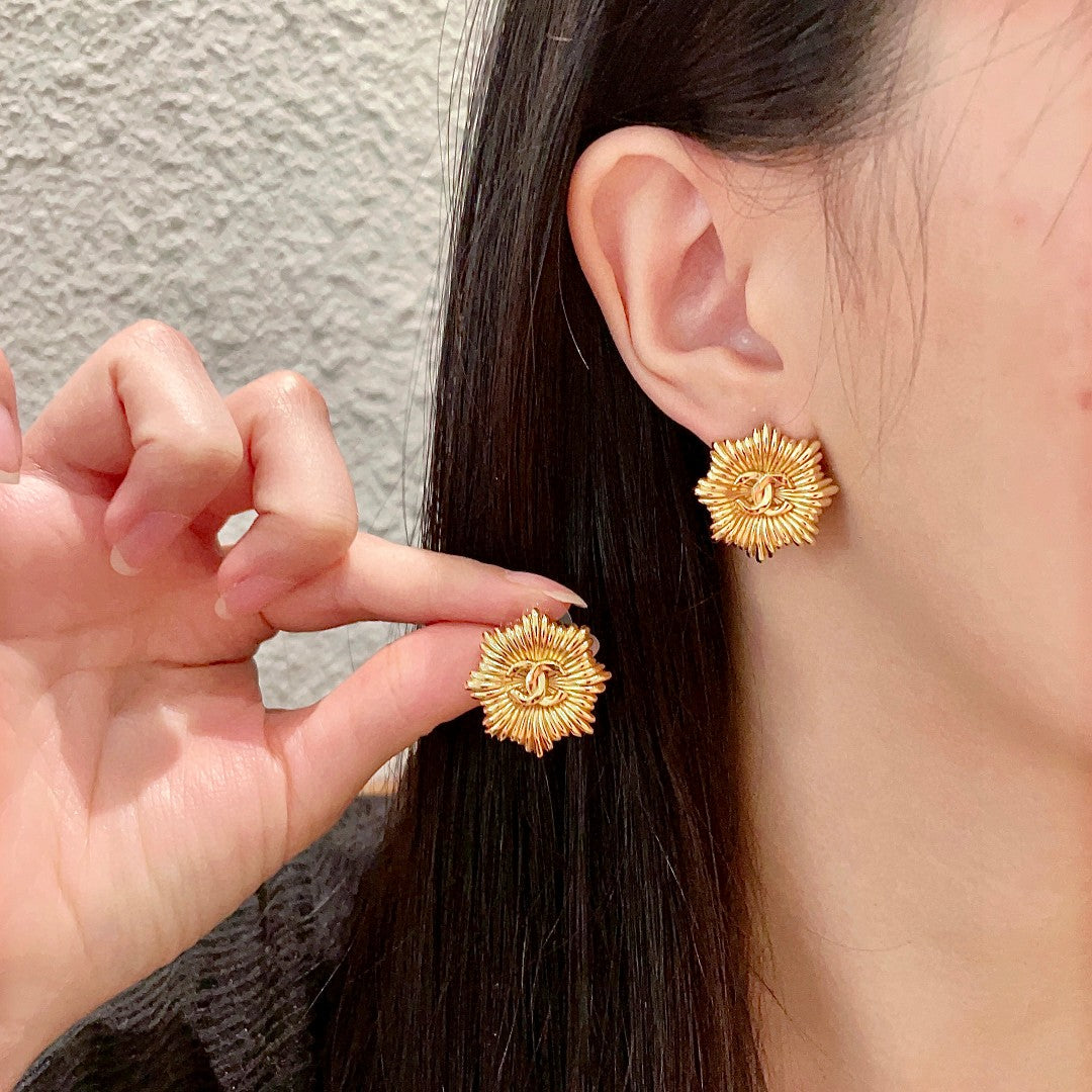 Double-C Emblem Stud Earrings in Polished Metal-Tone – Design 223 main product view