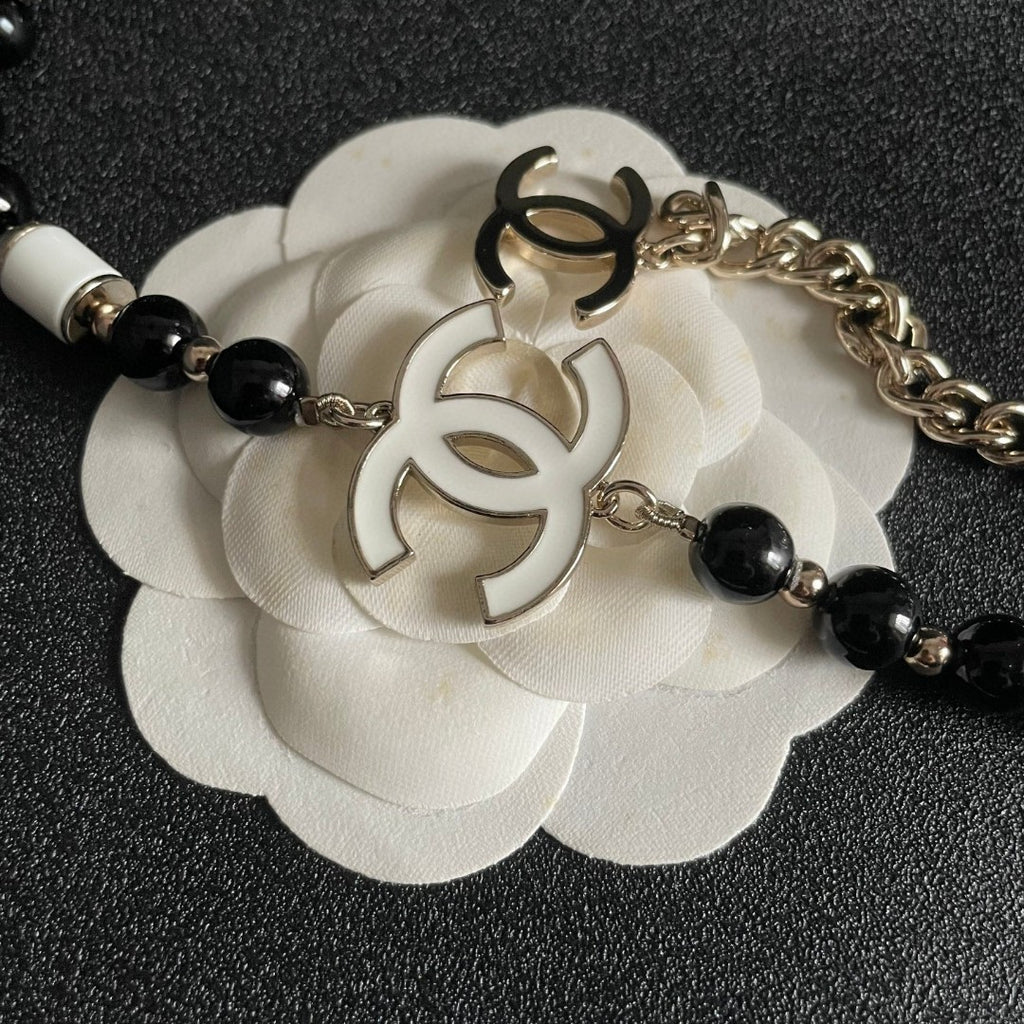 Double-C Emblem Pendant Necklace in Polished Metal-Tone – Black Detail main product view