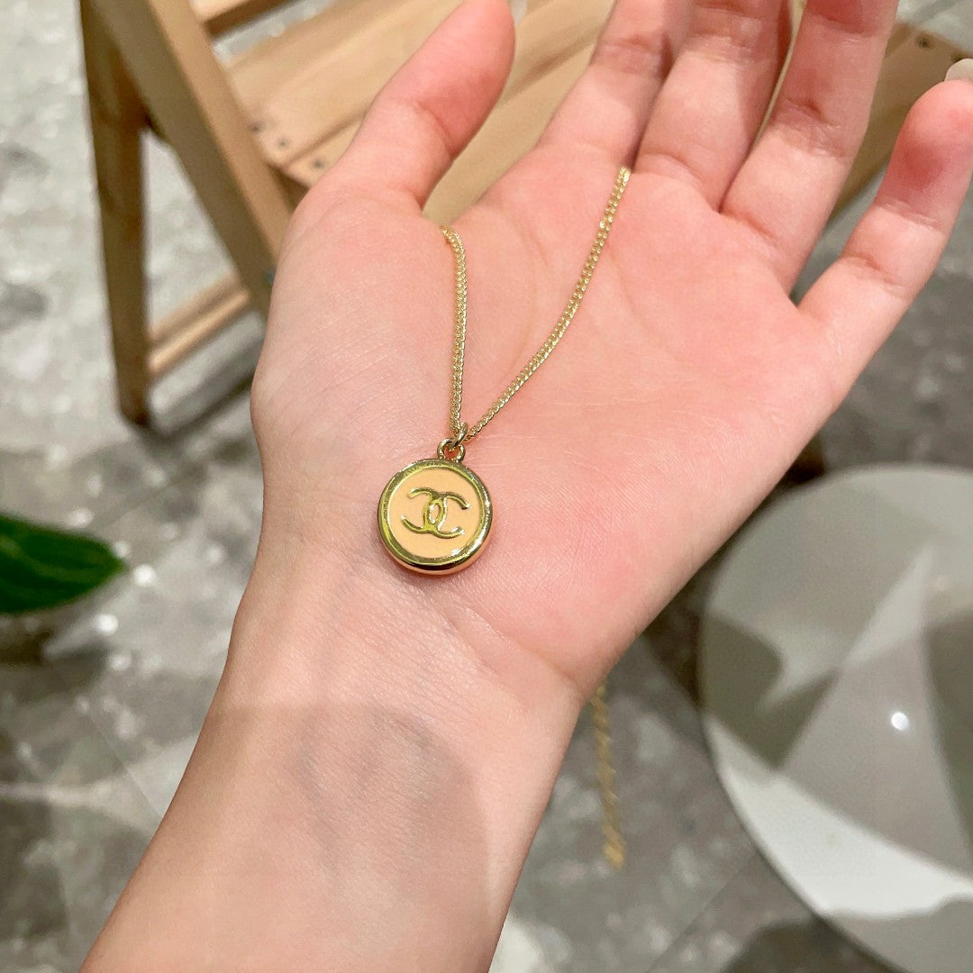 Double-C Emblem Pendant Necklace in Polished Metal-Tone – Design 028 side detail