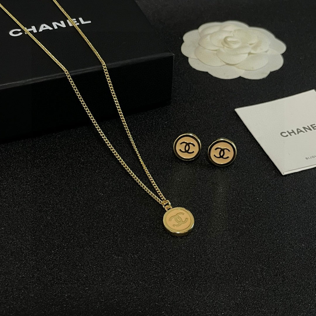 Double-C Emblem Pendant Necklace in Polished Metal-Tone – Design 028 detail view