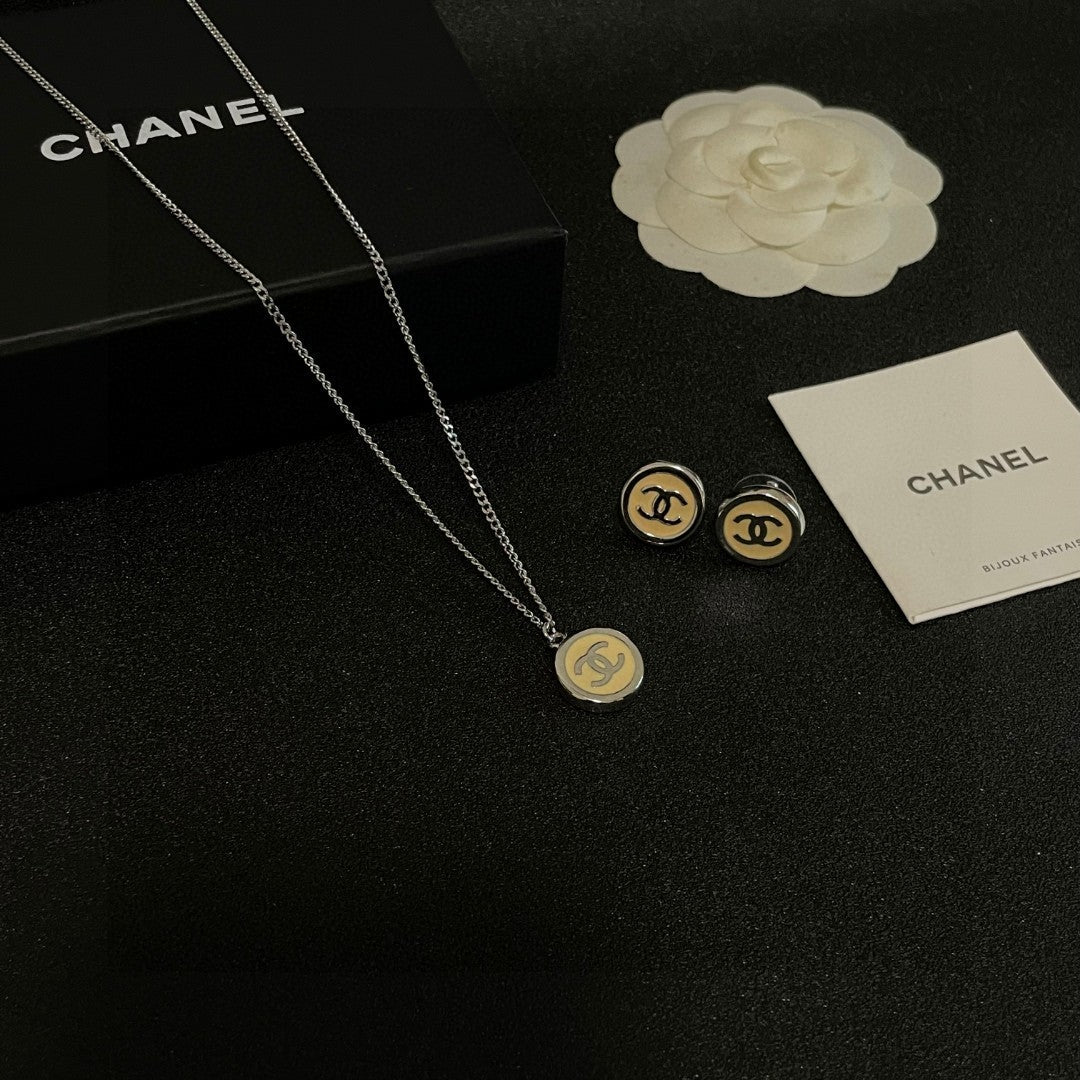 Double-C Emblem Stud Earrings in Polished Metal-Tone – Design 222 side detail
