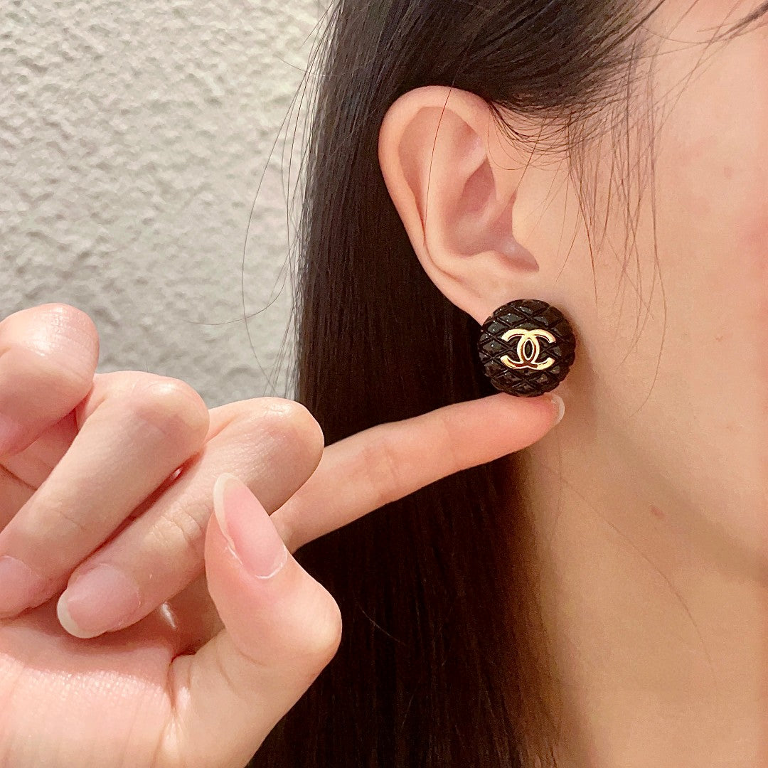 Double-C Emblem Stud Earrings in Polished Metal-Tone – Design 200 front product view