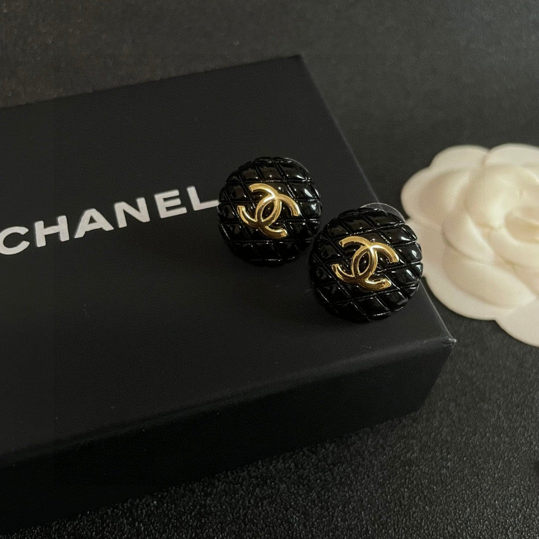 Double-C Emblem Stud Earrings in Polished Metal-Tone – Design 200 detail view