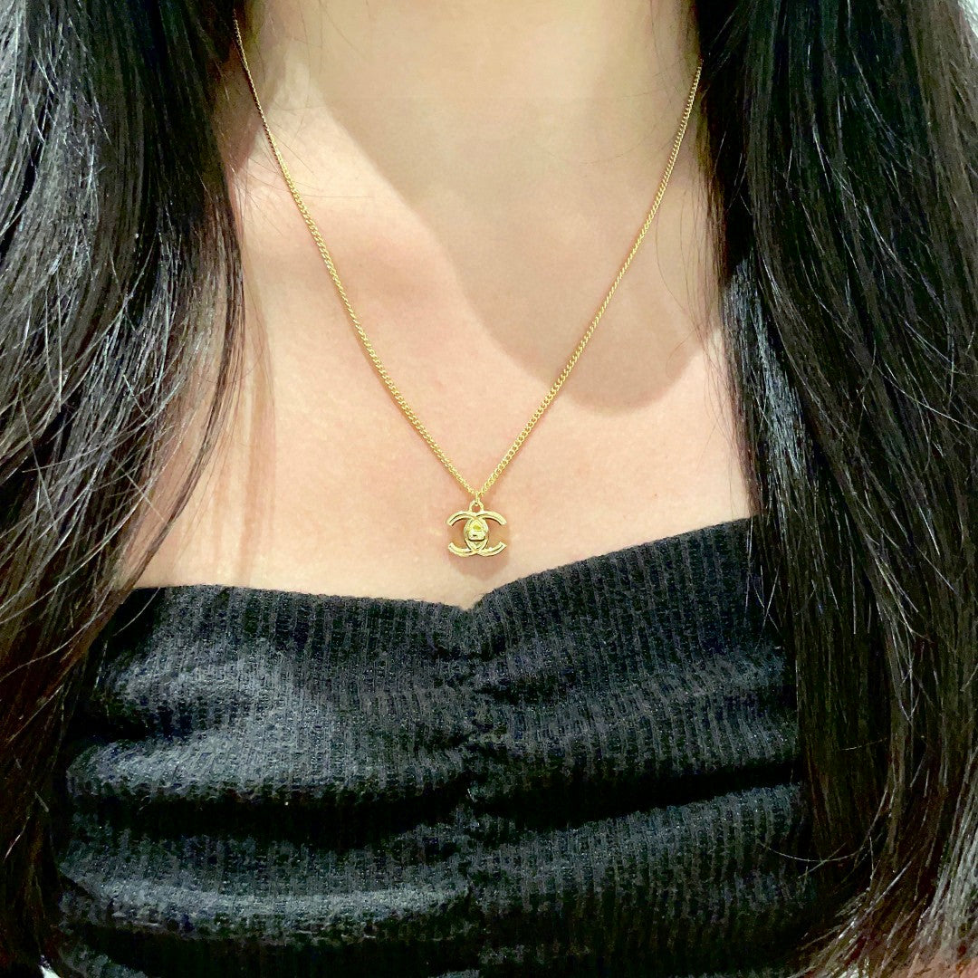 Double-C Emblem Pendant Necklace in Polished Metal-Tone – Design 024 detail view