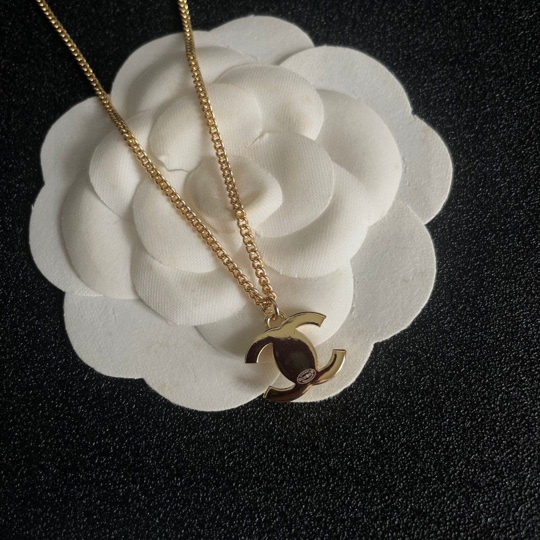 Double-C Emblem Pendant Necklace in Polished Metal-Tone – Design 024 front product view