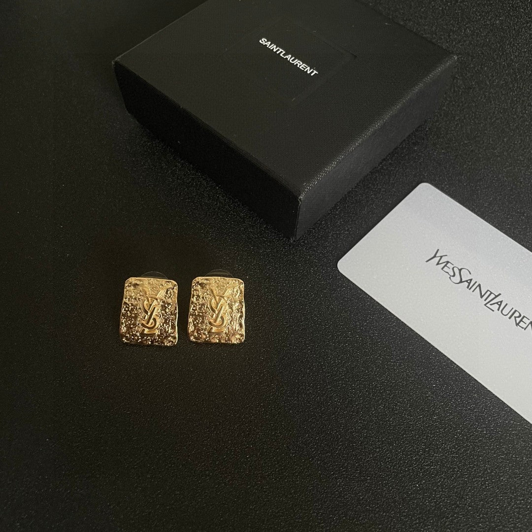 Letter Emblem Stud Earrings in Polished Metal-Tone – Design 008 close-up detail