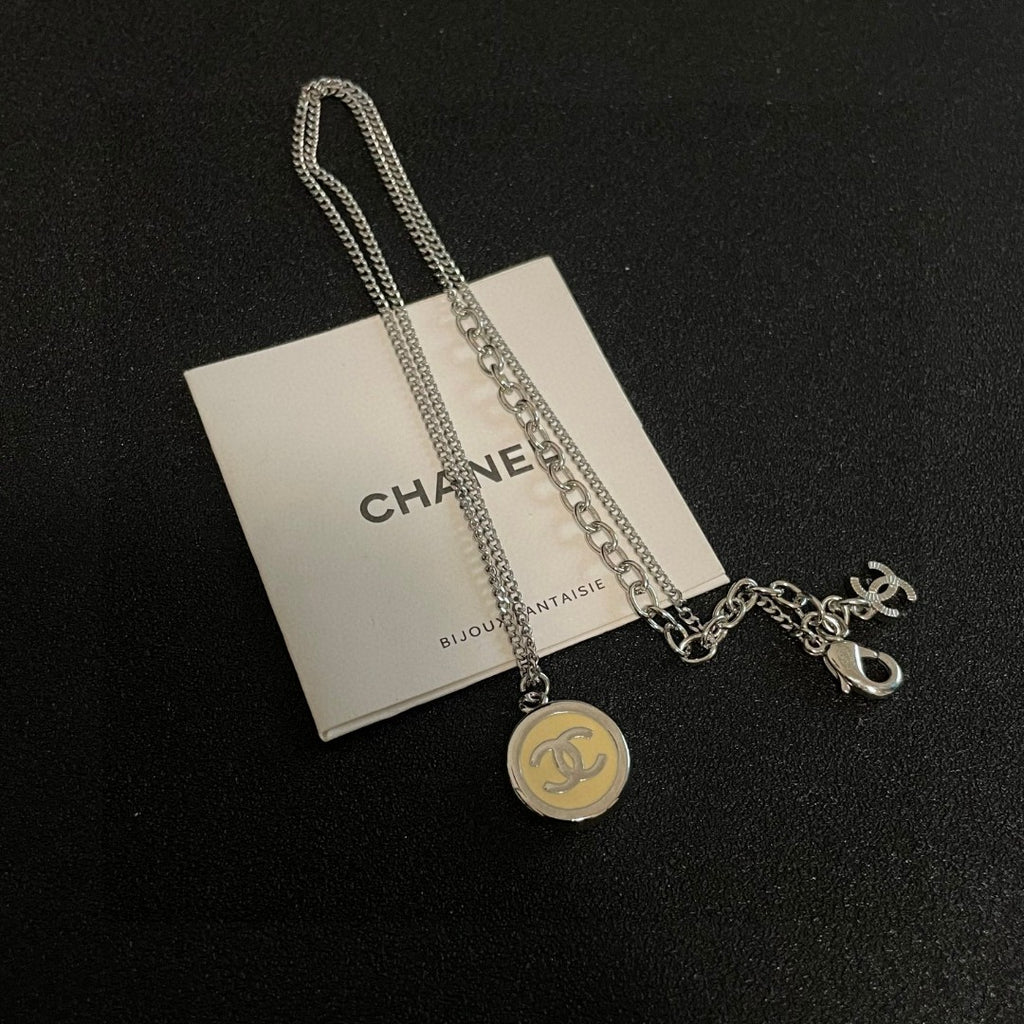 Double-C Emblem Pendant Necklace in Polished Metal-Tone – Design 019 close-up detail