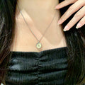 Double-C Emblem Pendant Necklace in Polished Metal-Tone – Design 019 main product view
