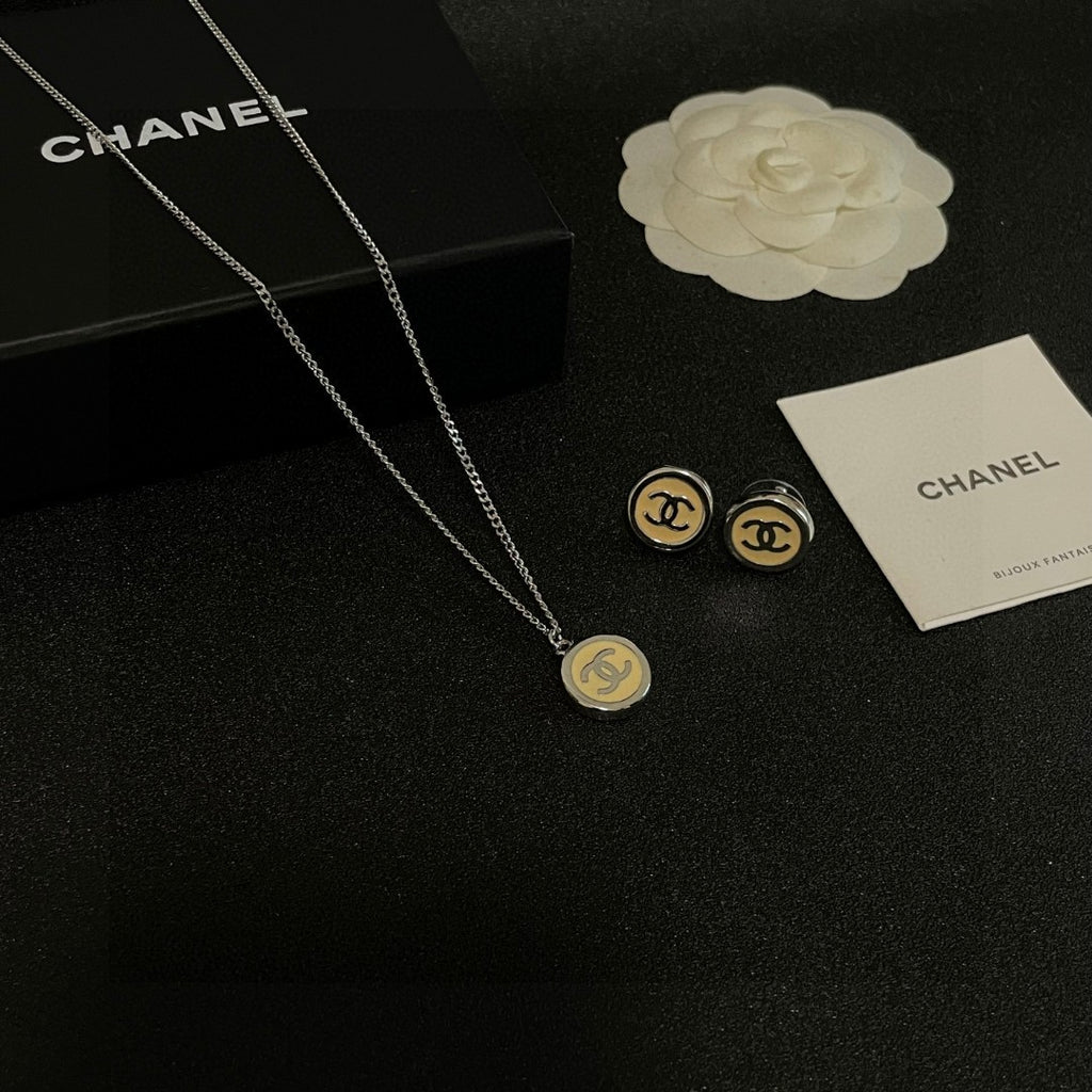 Double-C Emblem Pendant Necklace in Polished Metal-Tone – Design 019 detail view