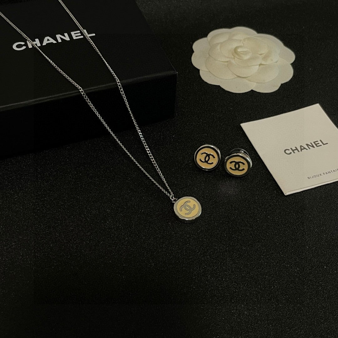 Double-C Emblem Pendant Necklace in Polished Metal-Tone – Design 019 detail view