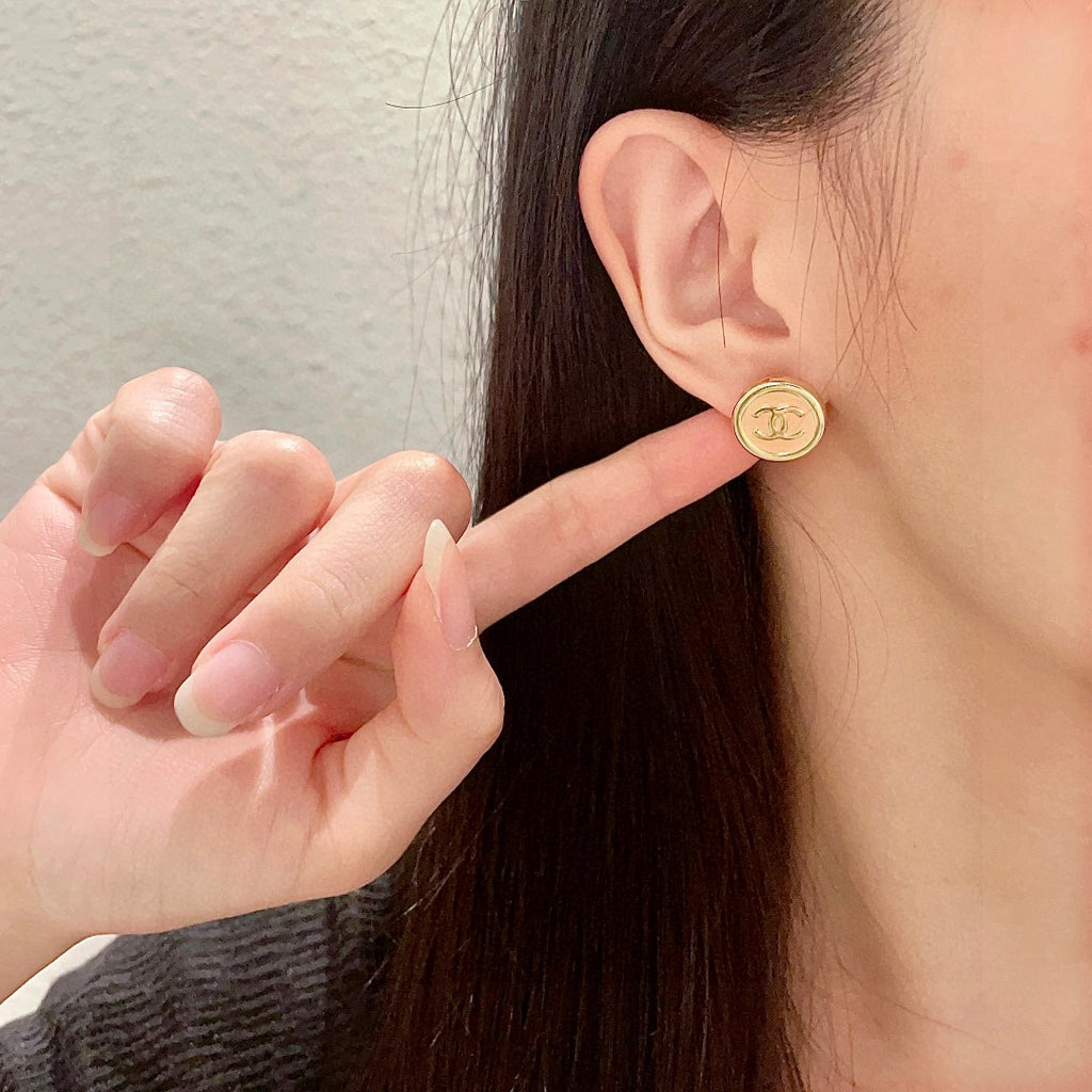 Double-C Emblem Stud Earrings in Polished Metal-Tone – Design 192 front product view
