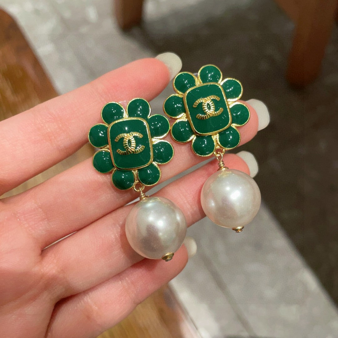 Double-C Emblem Pearl-Detail Statement Earrings – Pearl Detail – Design 012 side detail