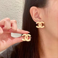 Double-C Emblem Stud Earrings in Polished Metal-Tone – Design 157 main product view