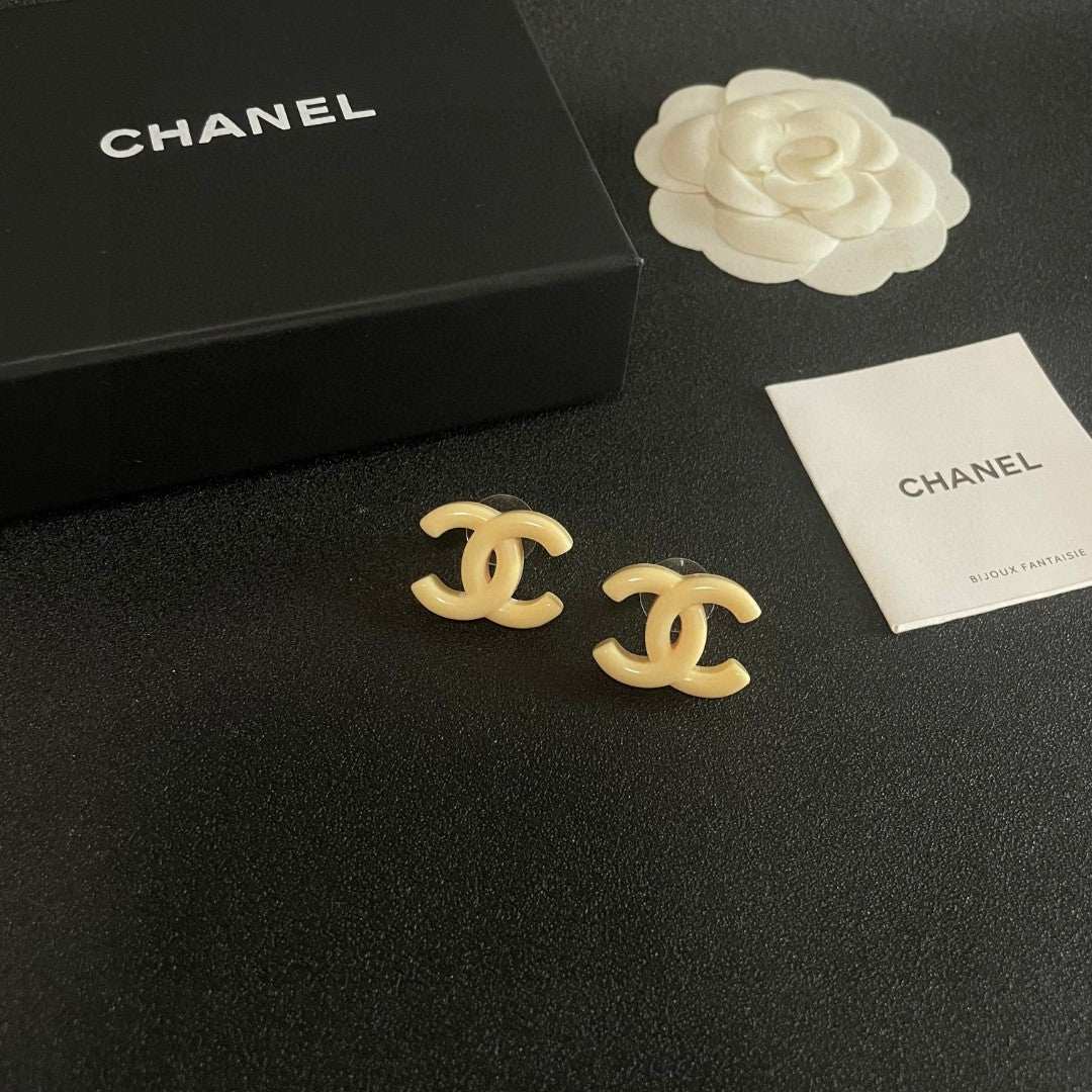 Double-C Emblem Stud Earrings in Polished Metal-Tone – Design 157 styled product view