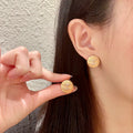 Double-C Emblem Stud Earrings in Polished Metal-Tone – Design 154 main product view