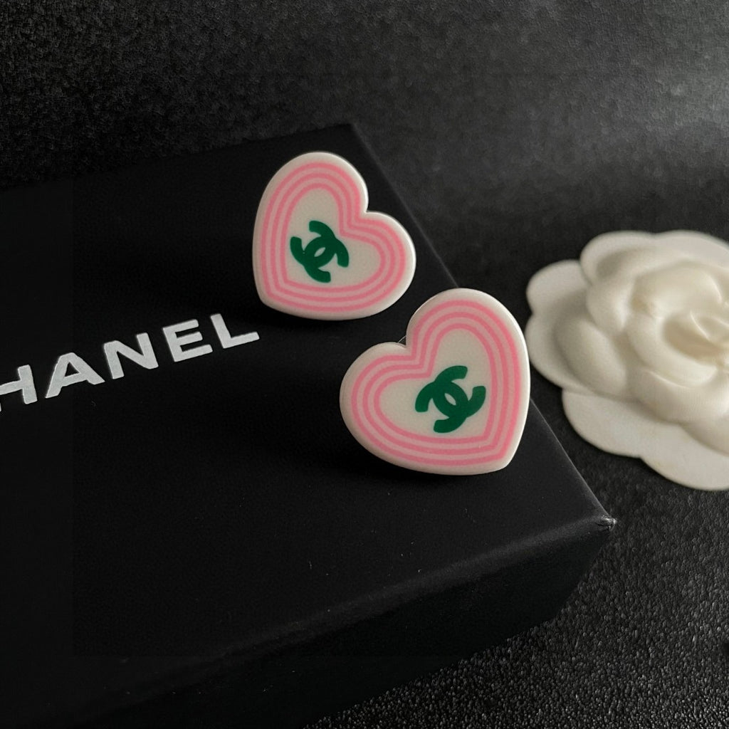 Double-C Emblem Stud Earrings in Polished Metal-Tone – Heart Detail – Design 004 detail view
