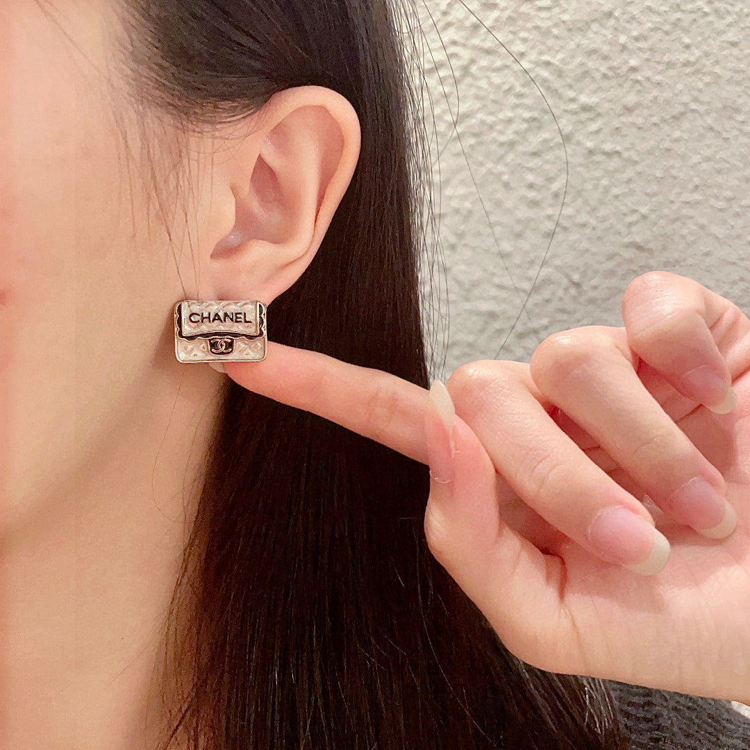 Double-C Emblem Stud Earrings in Polished Metal-Tone – Design 152 front product view
