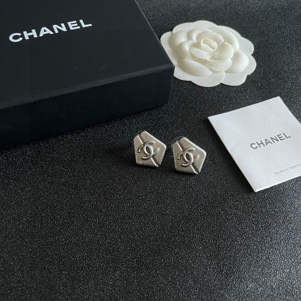 Double-C Emblem Stud Earrings in Polished Metal-Tone – Design 146 styled product view