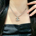 Double-C Emblem Pendant Necklace in Polished Metal-Tone – Design 011 main product view