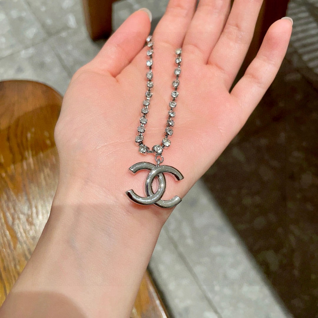 Double-C Emblem Pendant Necklace in Polished Metal-Tone – Design 011 side detail