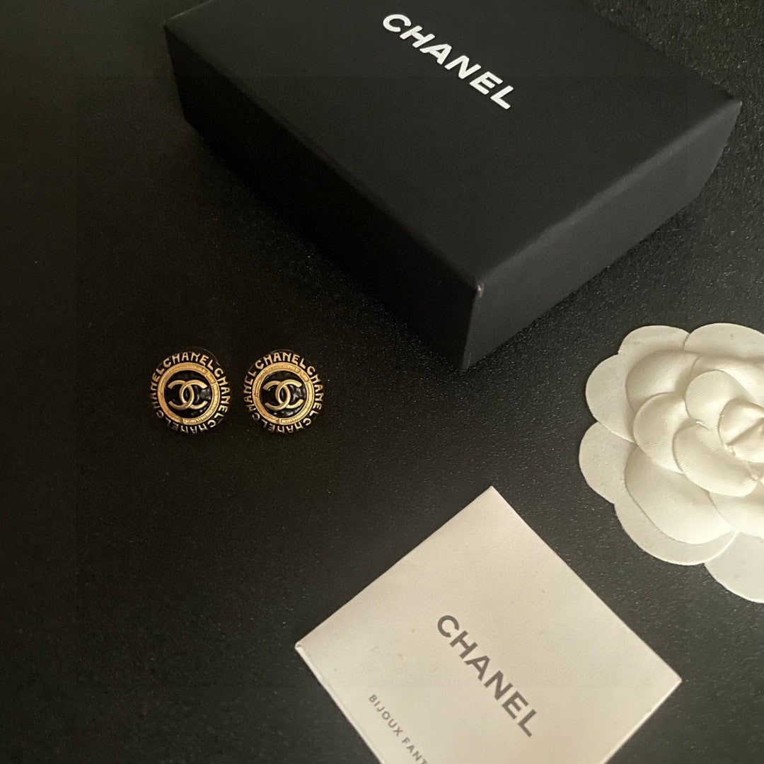 Double-C Emblem Stud Earrings in Polished Metal-Tone – Design 144 close-up detail