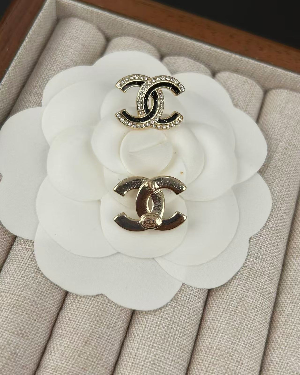 Signature Emblem Crystal-Accent Stud Earrings – Black Detail styled product view