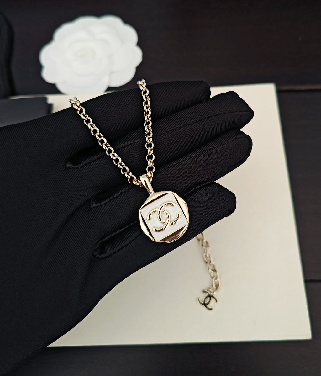 Signature Emblem Pendant Necklace in Gold-Tone – White Detail – Design 005 detail view