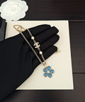 Signature Emblem Crystal-Accent Pendant Necklace – Blue Detail main product view