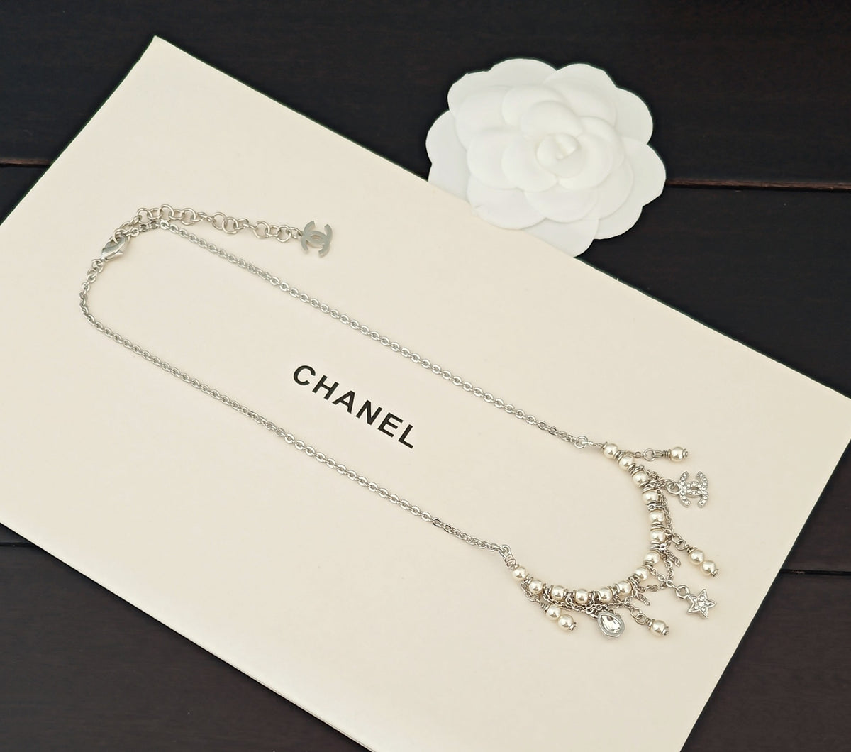 Signature Emblem Pendant Necklace in Gold-Tone – White Detail – Design 003 close-up detail