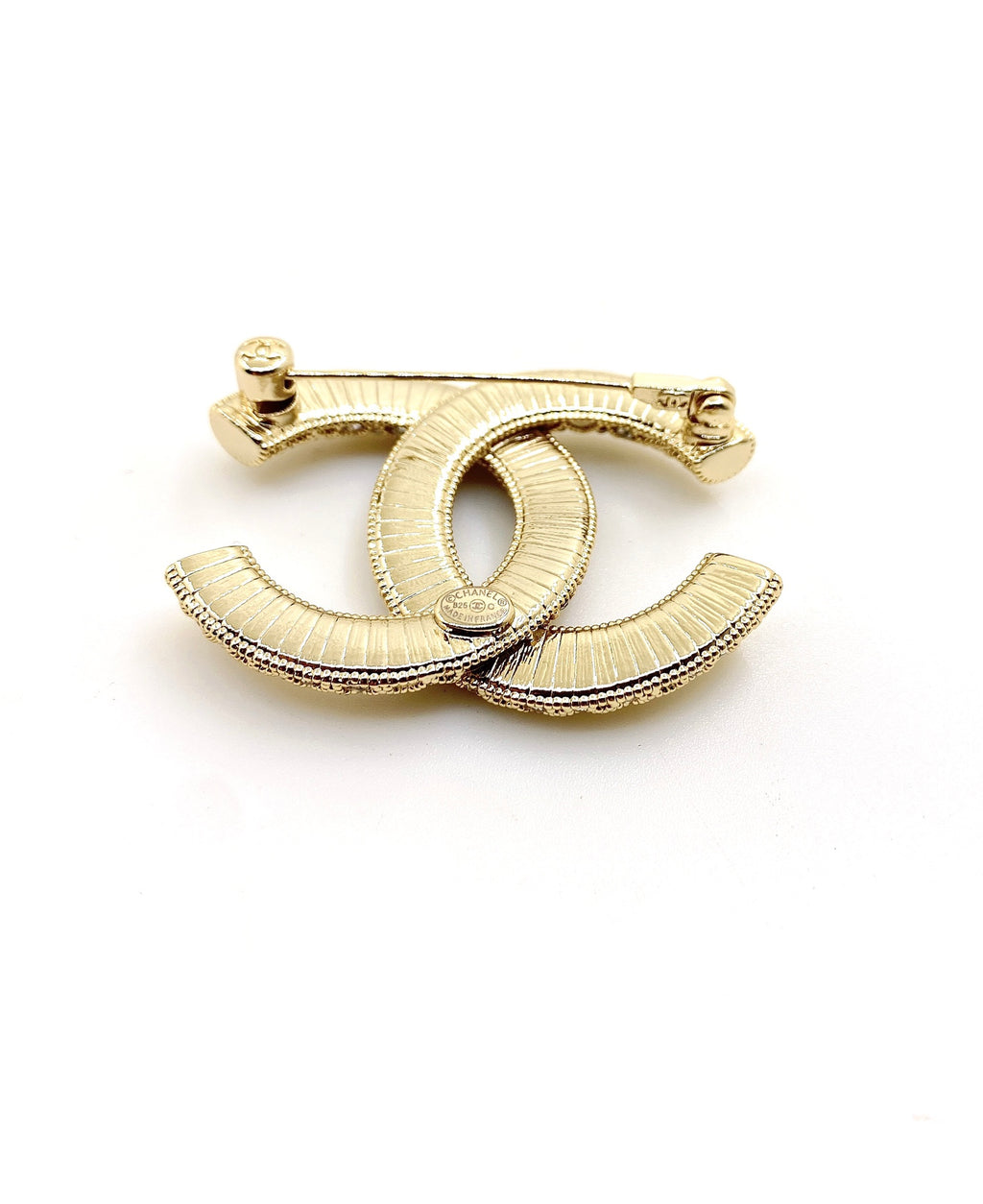 Double-C Emblem Brooch in Gold-Tone – Design 010 detail view