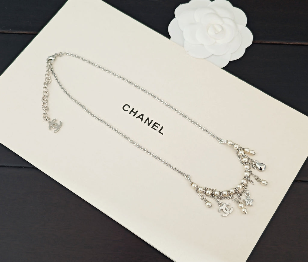 Signature Emblem Pendant Necklace in Gold-Tone – White Detail – Design 002 close-up detail