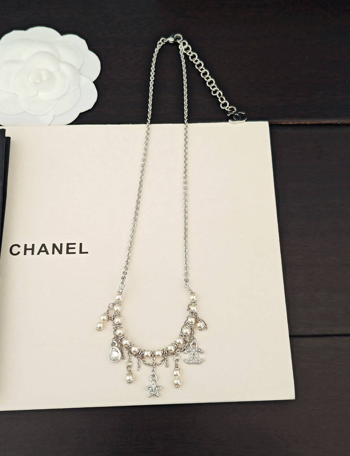 Signature Emblem Pendant Necklace in Gold-Tone – White Detail – Design 002 side detail