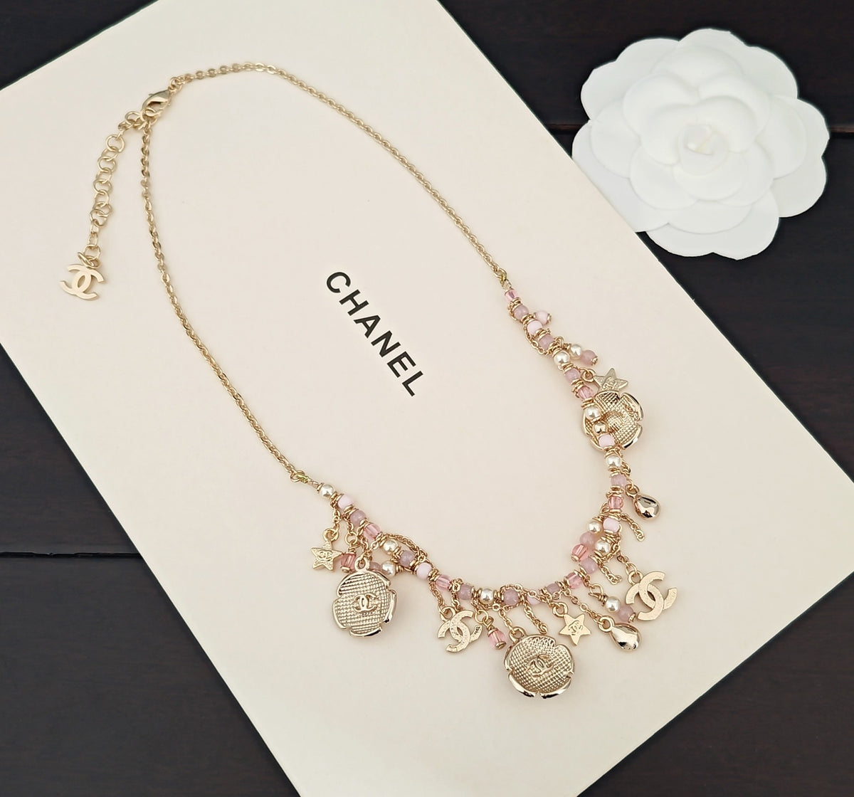 Signature Emblem Pendant Necklace in Gold-Tone – Pink Detail detail view