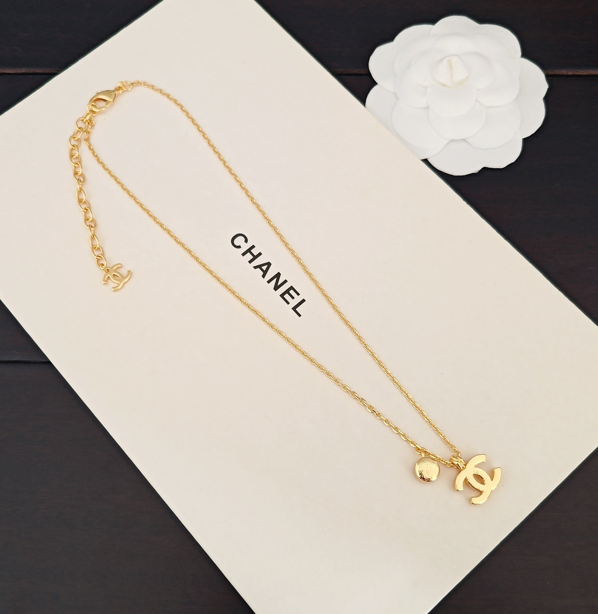 Signature Emblem Crystal-Accent Pendant Necklace – White Detail – Design 002 detail view