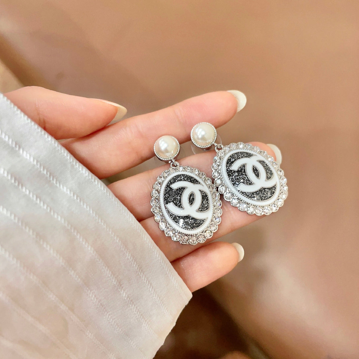 Double-C Emblem Pearl-Detail Statement Earrings – Pearl Detail – Design 015 side detail