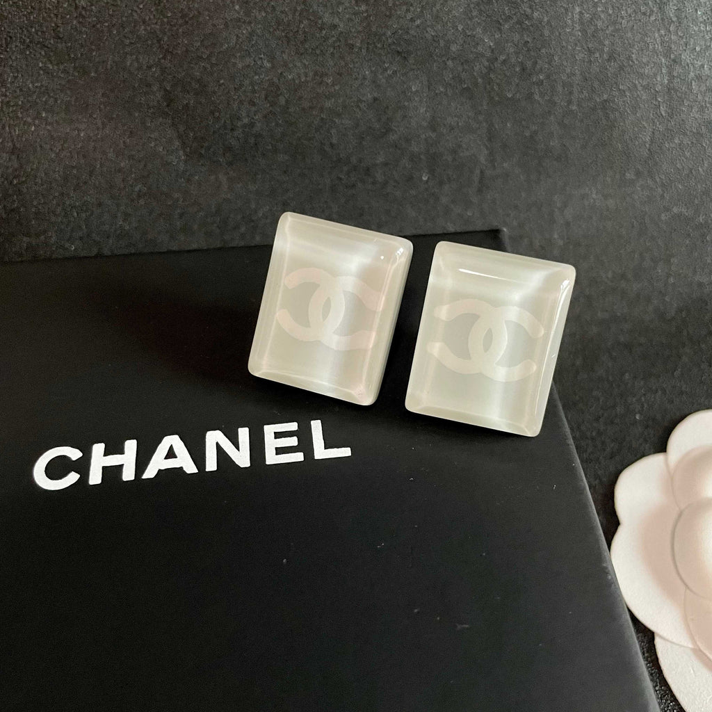 Double-C Emblem Stud Earrings in Polished Metal-Tone – Design 268 detail view