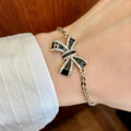 Double-C Emblem Bracelet in Polished Metal-Tone – Design 007 main product view