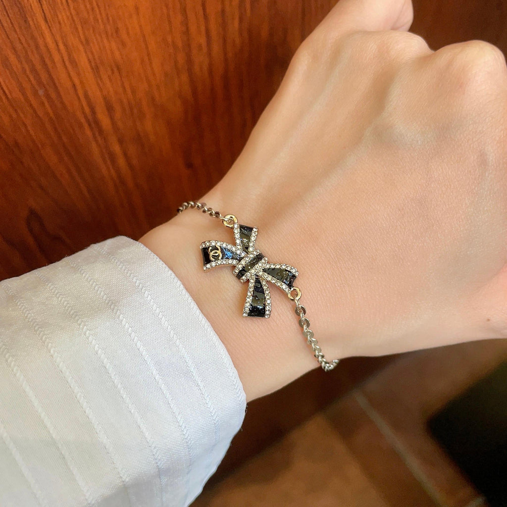 Double-C Emblem Bracelet in Polished Metal-Tone – Design 007 front product view