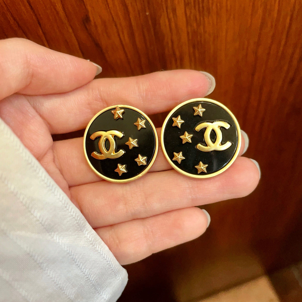 Double-C Emblem Stud Earrings in Polished Metal-Tone – Star Detail – Design 006 side detail