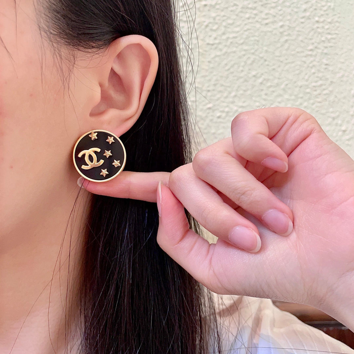 Double-C Emblem Stud Earrings in Polished Metal-Tone – Star Detail – Design 007 front product view
