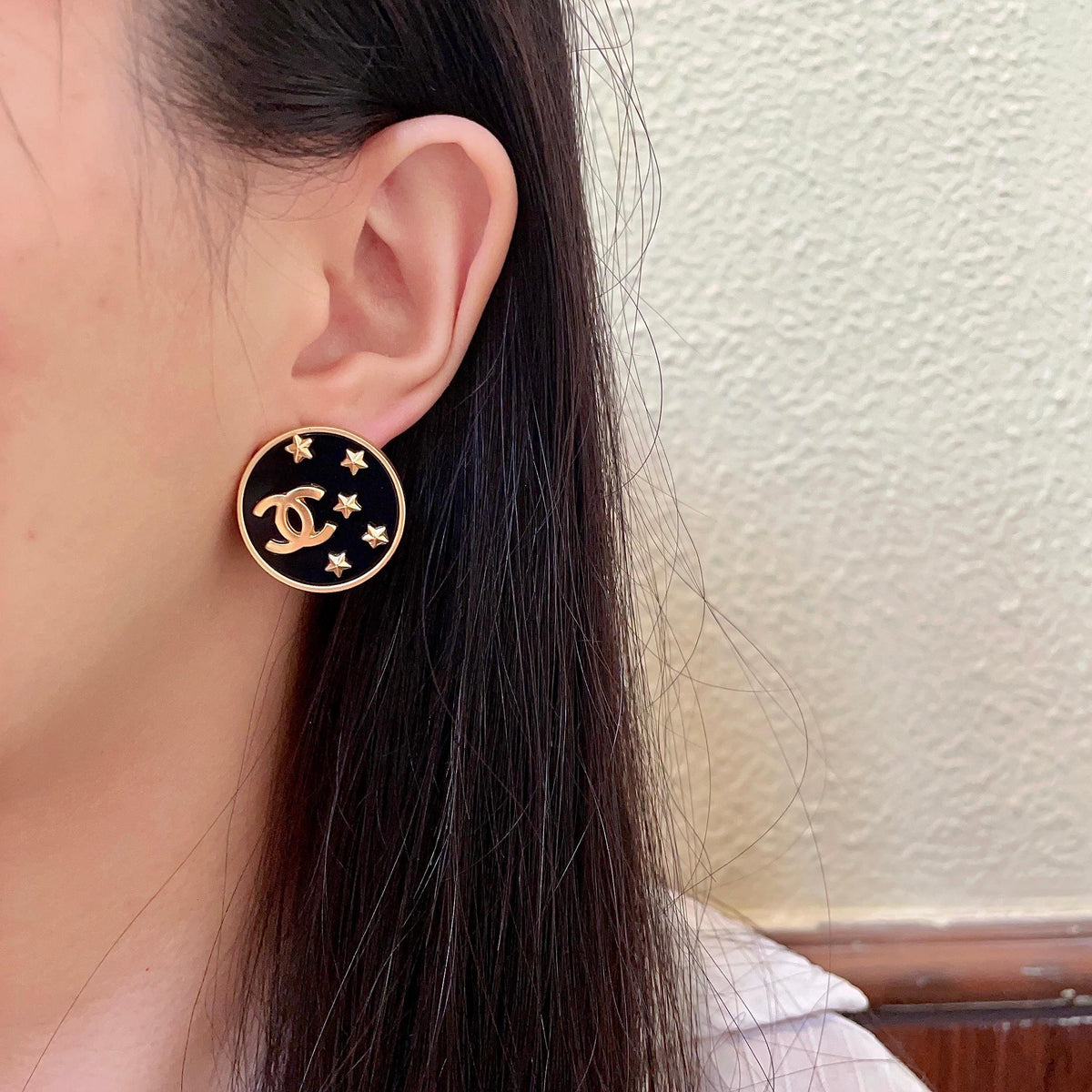 Double-C Emblem Stud Earrings in Polished Metal-Tone – Star Detail – Design 007 detail view
