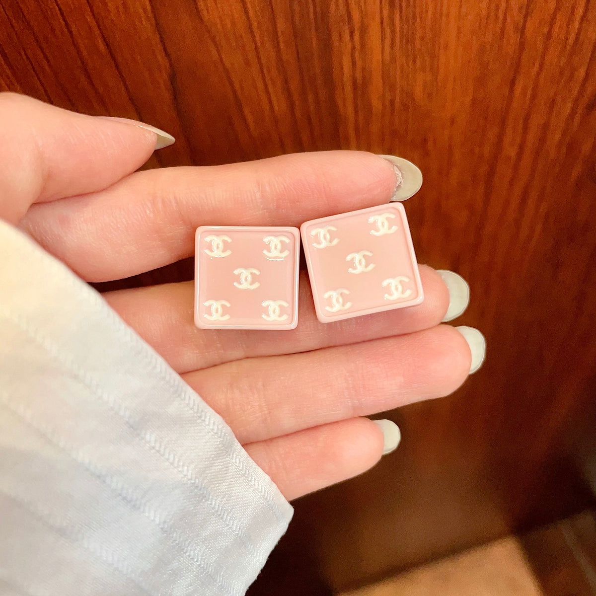 Double-C Emblem Stud Earrings in Polished Metal-Tone – Design 229 side detail