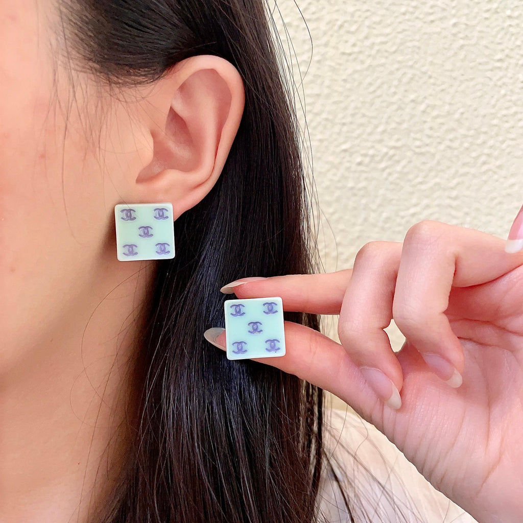 Double-C Emblem Stud Earrings in Polished Metal-Tone – Design 274 main product view