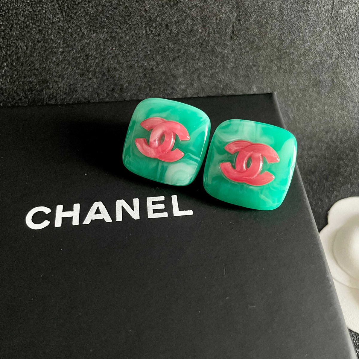 Double-C Emblem Stud Earrings in Polished Metal-Tone – Design 319 detail view
