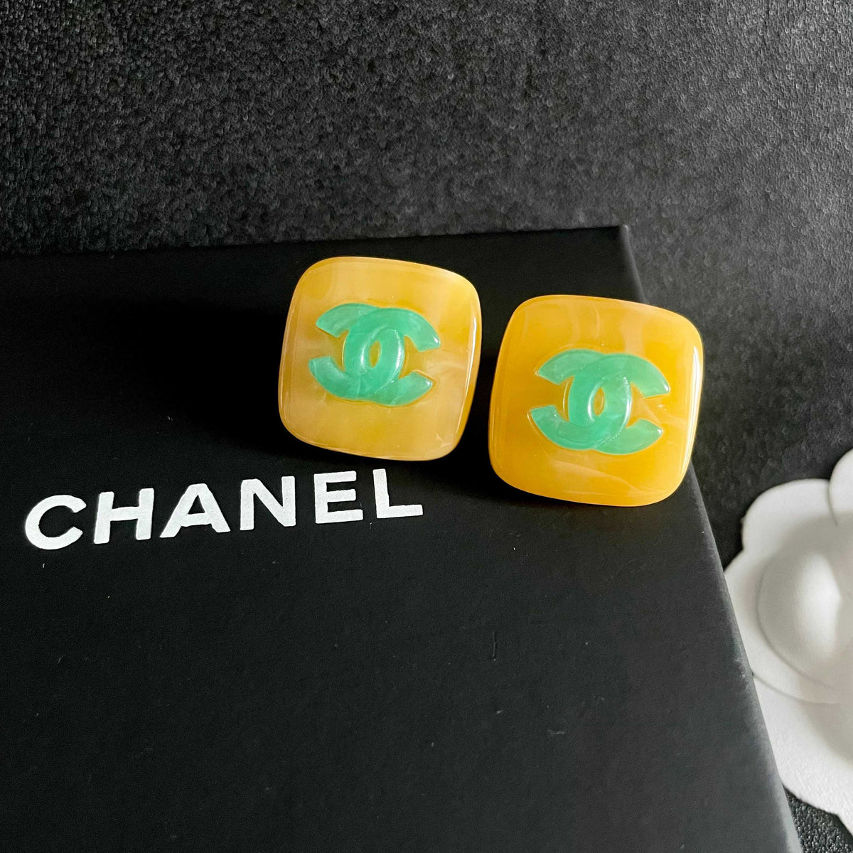 Double-C Emblem Stud Earrings in Polished Metal-Tone – Design 318 detail view