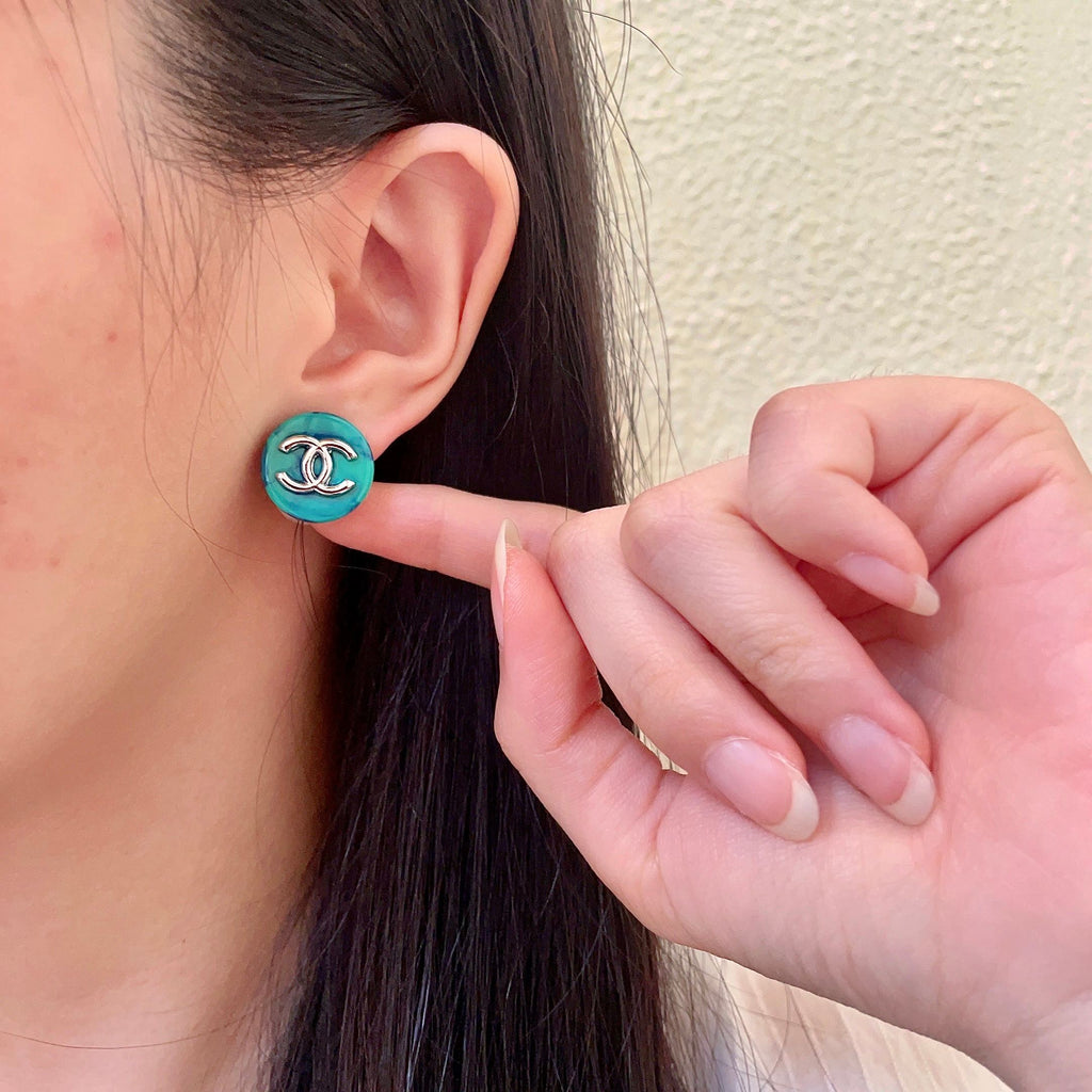 Double-C Emblem Stud Earrings in Polished Metal-Tone – Design 290 front product view