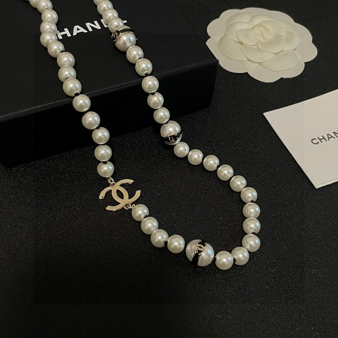 Double-C Emblem Pearl-Detail Pendant Necklace – Pearl Detail – Design 007 close-up detail